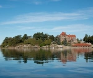 Waterfront view of Singer Castle on Dark Island